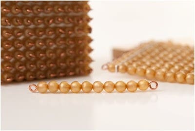 A close up of beads on the table